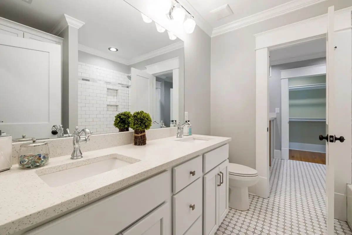 A clean, bright bathroom, the usual place a moisture check starts. Albany.