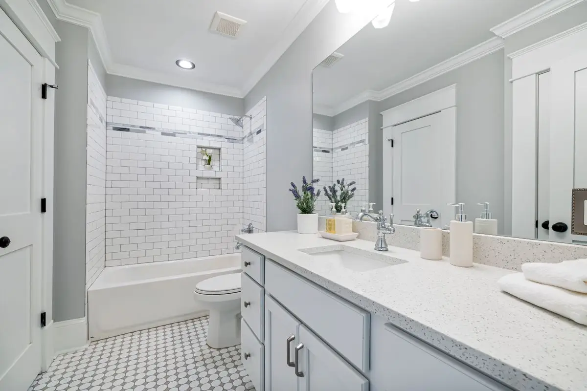 A clean, bright bathroom, the usual place a moisture check starts. Albany.