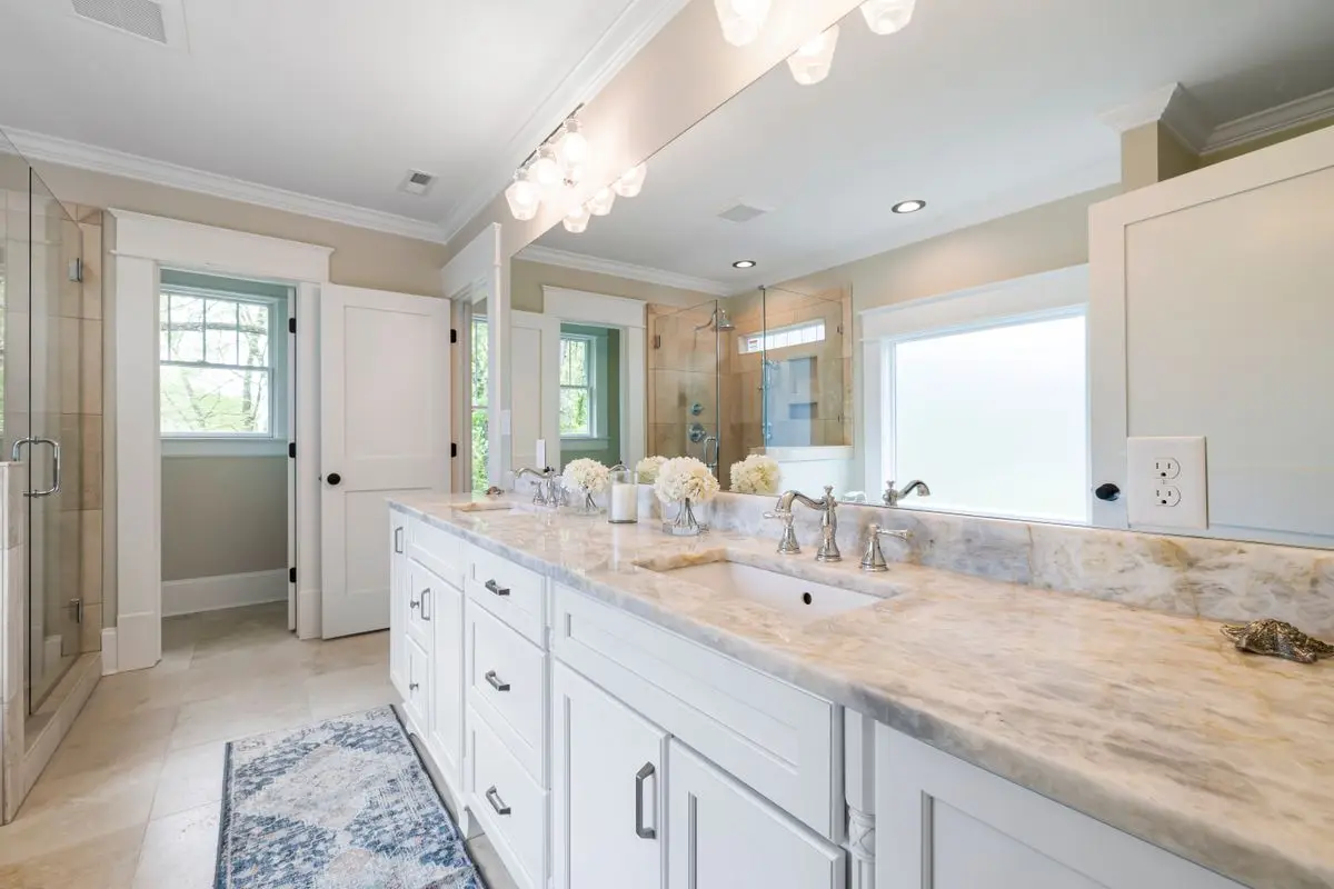 A clean, bright bathroom, the usual place a moisture check starts. Albany.