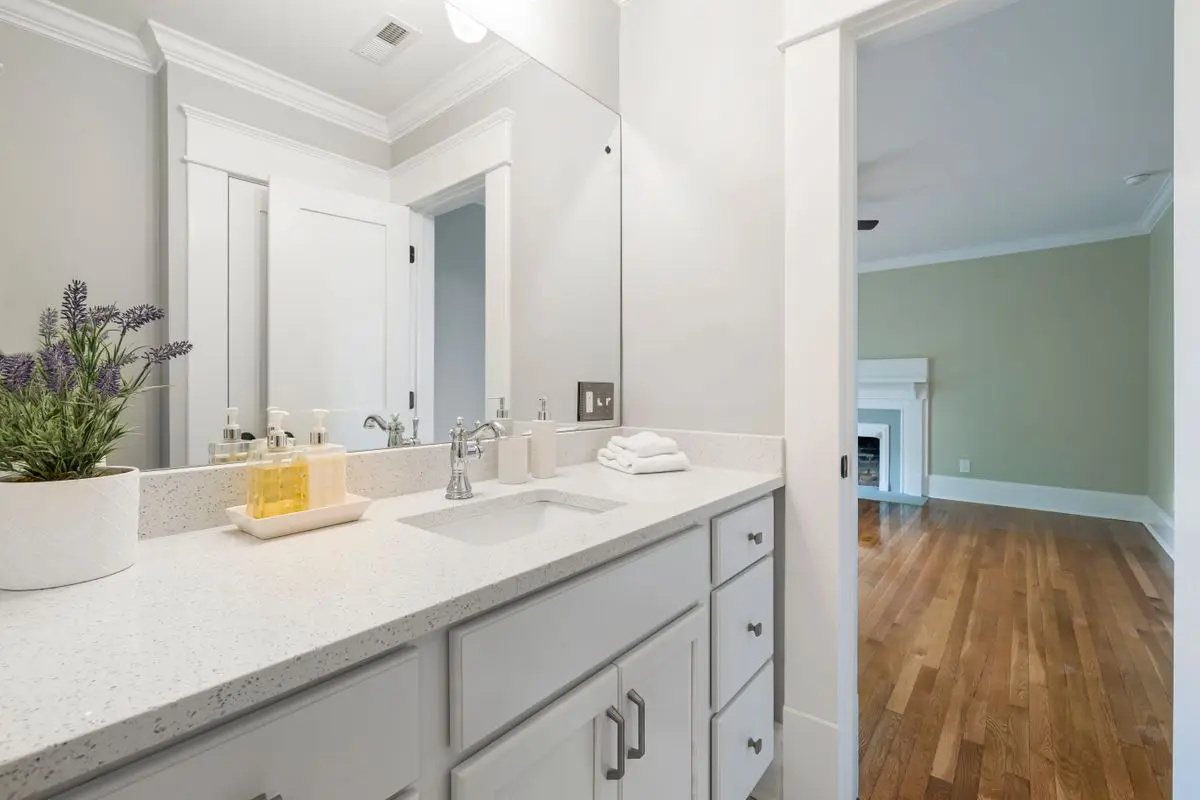 A clean, bright bathroom, the usual place a moisture check starts. Albany.